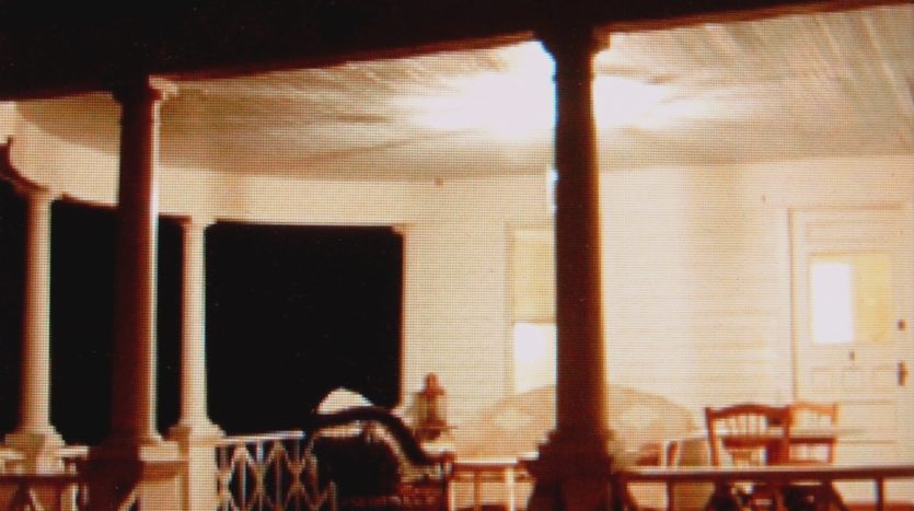 A view of a porch at night